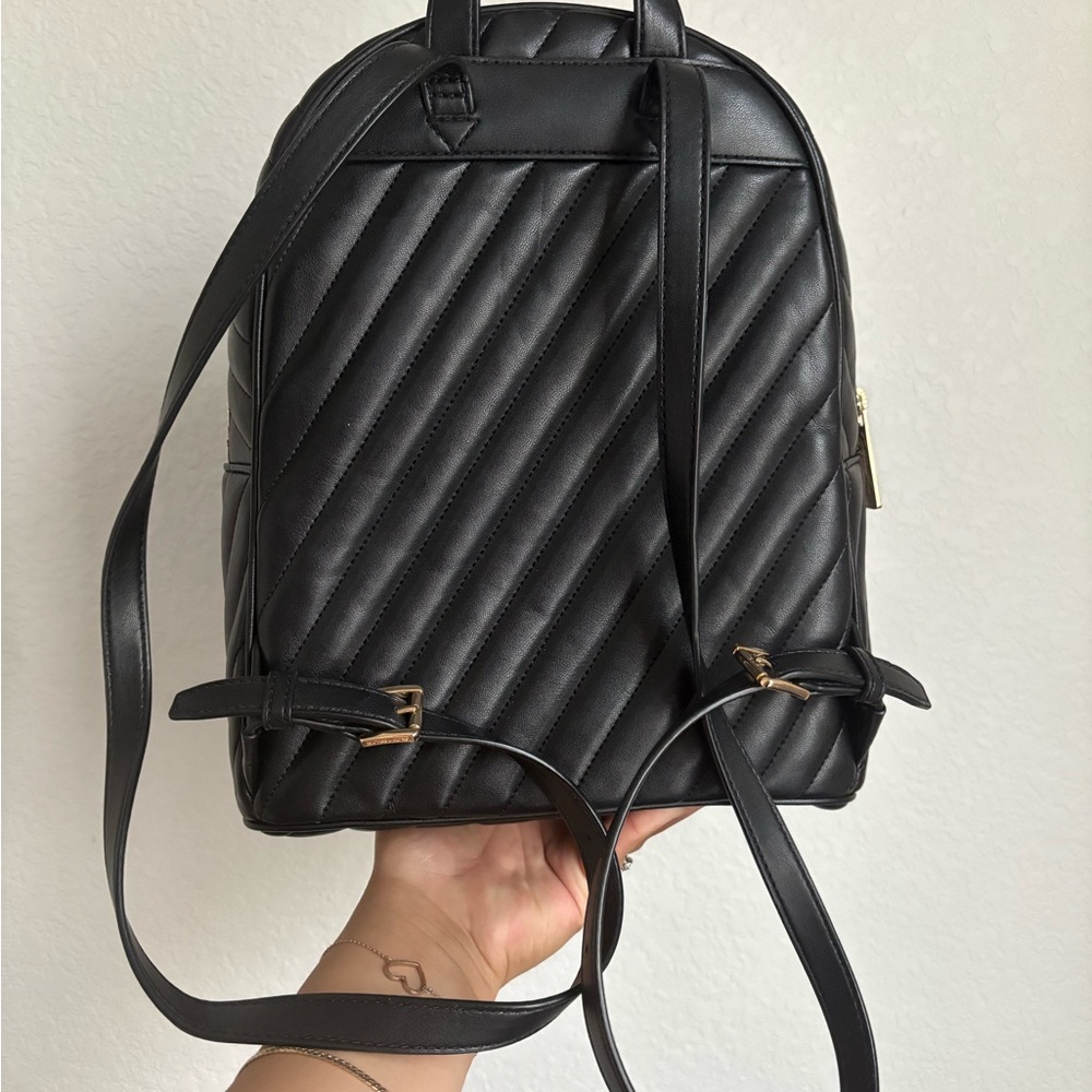Michael Kors Erin Quilted Black Backpack with Gold Details - Picture 3 of 5